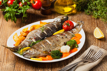 Grilled whole trout. Served with baked potatoes.