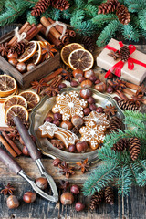 Christmas food background. Fruits, cookies, spices and nuts