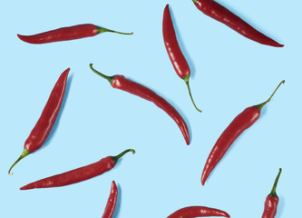Flat lay red chili peppers pattern