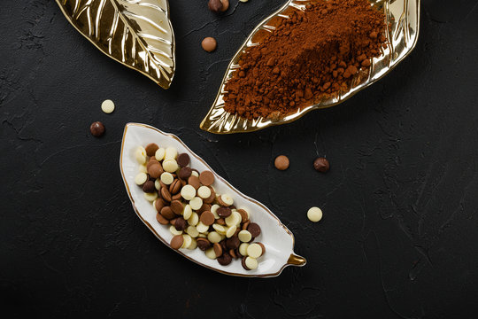 chocolate chips morsels on black background