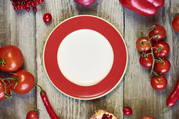 Assorted types of yellow fruits and vegetables on wooden background