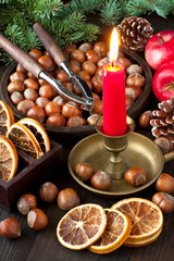 Christmas composition with apples, hazelnuts and spices