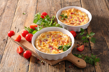 quiche on wood background