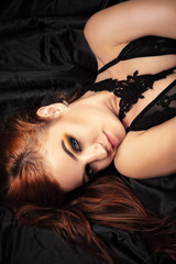 beautiful redhead girl with fashionable makeup