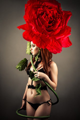 luxurious woman in lingerie with fashion rose flower