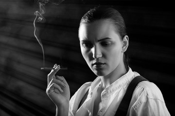 Fototapeta premium woman smoking cigarette