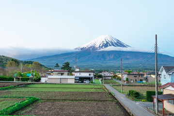 Fototapeta premium Mountain fuji and clouds at kawaguchi at morning in autumn view behind Kawaguchiko village yamanachi in Japan .