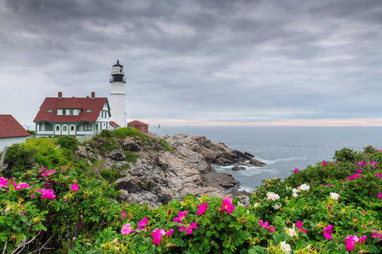 Portland Head Light At Summer Cloudy Day And Flowers In Maine, New England.