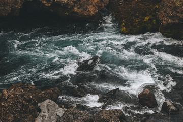 high angle view of beautiful mountain river flowing through highlands in Iceland