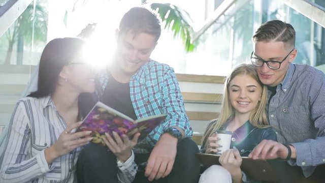 Students Studying, Reading Educational Book In College