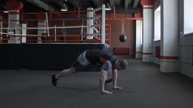 Rope Climb exercise man workout at gym