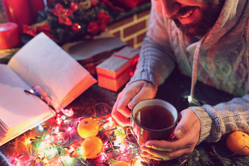man with a blank book in his hands for the New Year's table with