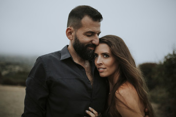 Sweet couple affectionate outdoors