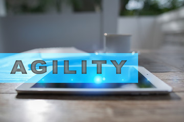 Agility text on virtual screen. Business technology and internet concept.?
