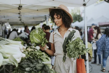 Foto op Plexiglas Beautiful woman buying kale at a farmers market © Rawpixel.com