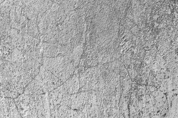 Fototapeta premium Wall fragment with scratches and cracks. It can be used as a background