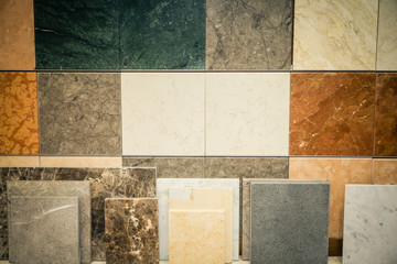 Marble slabs on a shelf. Wall and floor  tiles