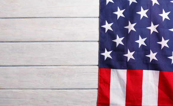 American flag close up on wood desk
