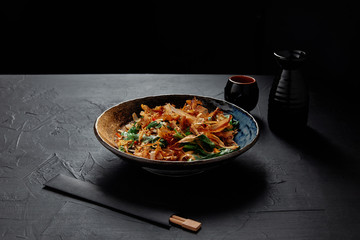 high angle view of gourmet japanese dish on plate and chopsticks