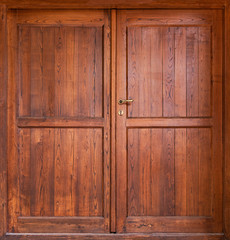 Wooden double door with vertical boards