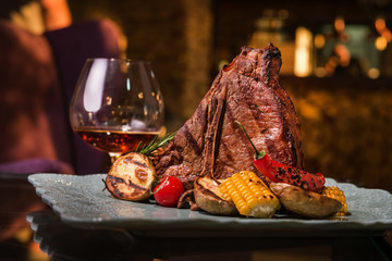 Grilled t-bone steak with grilled vegetables