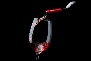 Pouring red wine