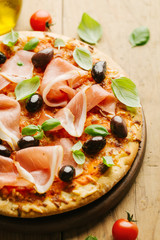Italian pizza on wooden table