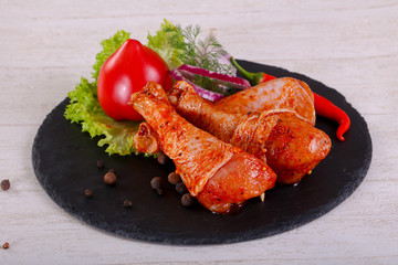 Raw marinated chicken legs