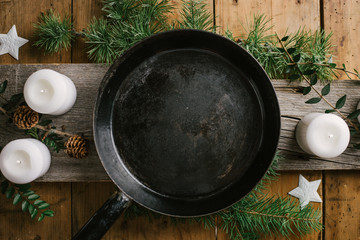 Christmas dinner table with empty pan ready to be served