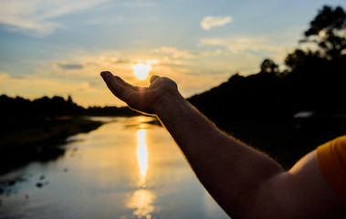 Capture moment to admire sunset nature beauty. Enjoy sunset above river surface. River sun...