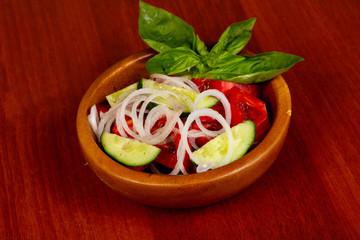 Salad with tomato and cucumbers