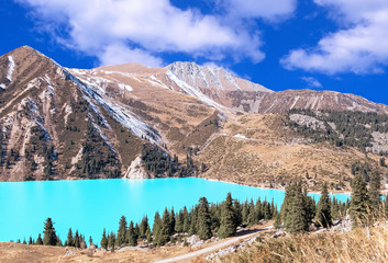 Emerald Big Almaty Lake in autumn season.