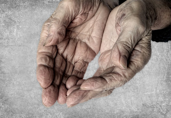 Hands of old woman. The begging