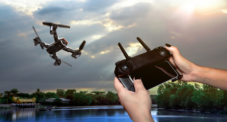 Drone Technology Is controlled by remote control concept . Pocket spy Foldable Drone quadrocopter,...