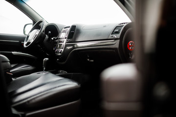 Fototapeta na wymiar Modern luxury prestige car interior, dashboard, steering wheel.