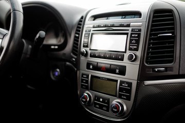 Obraz na płótnie Canvas Detail on the start button in a car. Car interior, key, start&st