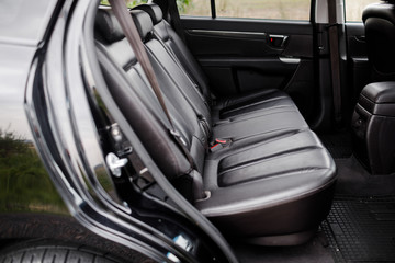Modern luxury prestige car interior, dashboard, steering wheel.