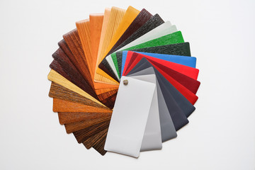 Samples of the colored lamination. The color palette on the table