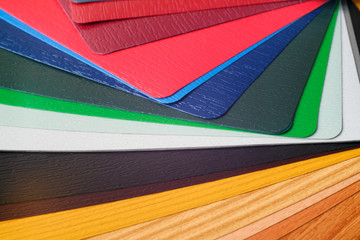 Samples of the colored lamination. The color palette on the table