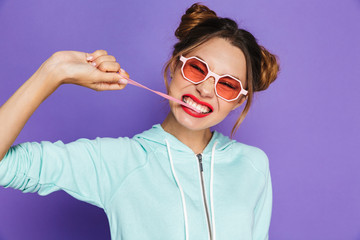 Portrait of a funny young girl with bright makeup
