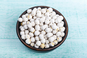 raw chickpeas in the plate on the table