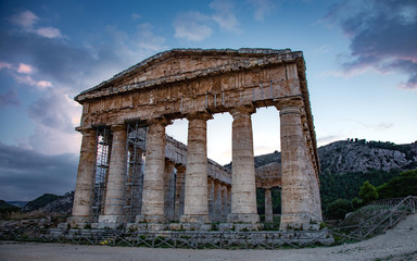 Fototapeta premium The ruins of the Greek temple at sunset in the ancient city of Segesta, Sicily, Italy