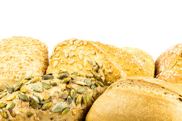 some tasty german bread roll with grains and flour on top, german buns