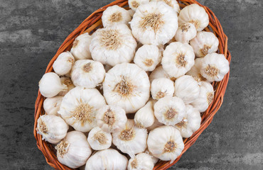 Pile of Fresh Organic Garlic on Vintage Wooden Background