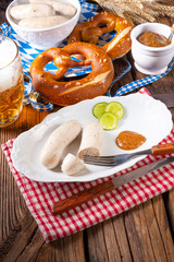 delicious bavarian oktoberfest white sausage with sweet mustard