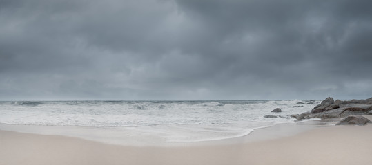 panorama view of nice sandy beach during stormy day