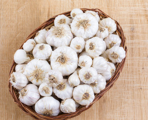 Pile of Fresh Organic Garlic on Vintage Wooden Background