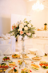 Wedding bouquet in restaurant on the table