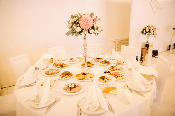 Wedding bouquet in restaurant on the table