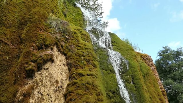 Travertine waterfall Dreinmuehlen (engl. three mills) at Nohn in  Vulkan Eifel region (Germany)